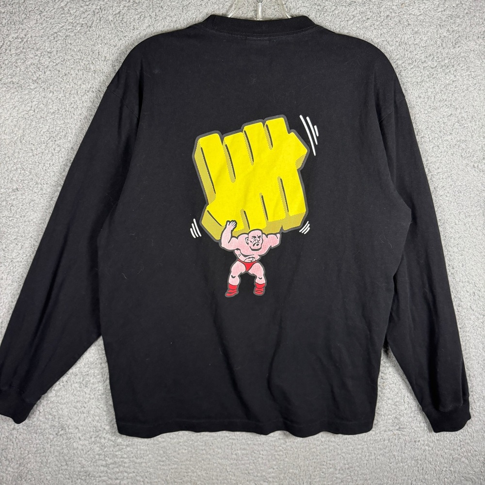 Undefeated‎ Mens Long Sleeve Graphic Tee Black Bodybuilder Logo Size Large